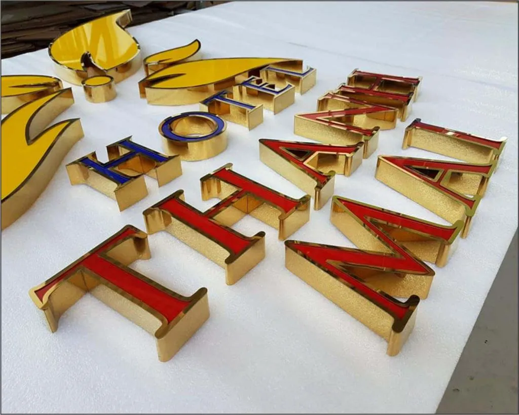 Gia công chữ và logo inox theo thiết kế, lựa chọn bề mặt gương hoặc xước. Thống nhất loại inox, độ dày, độ nổi và cách hoàn thiện trước khi sản xuất.